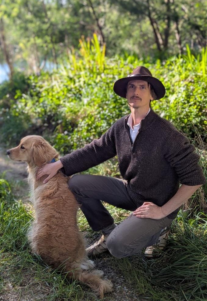 Warwick Marshall with a dog — Gold Standard Dog Training, Golden Bay
